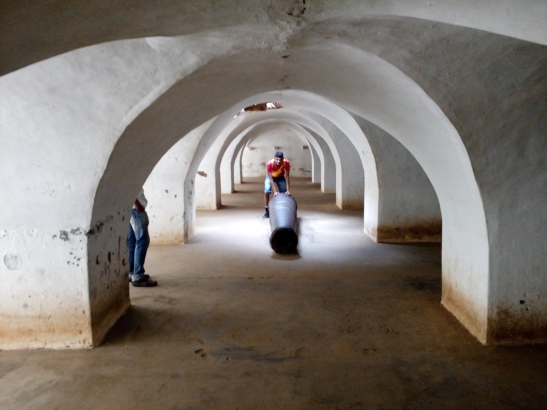 A long whitewashed arched passage inside Srirangapatna