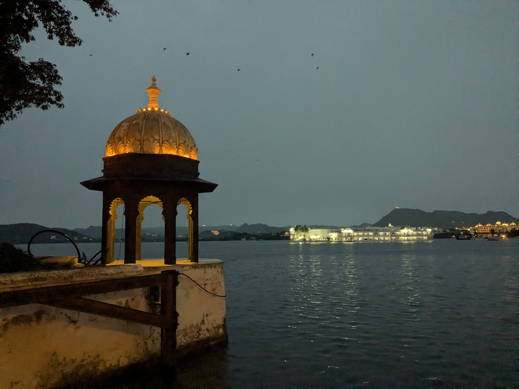 Lake Pichola and the illuminated city at night