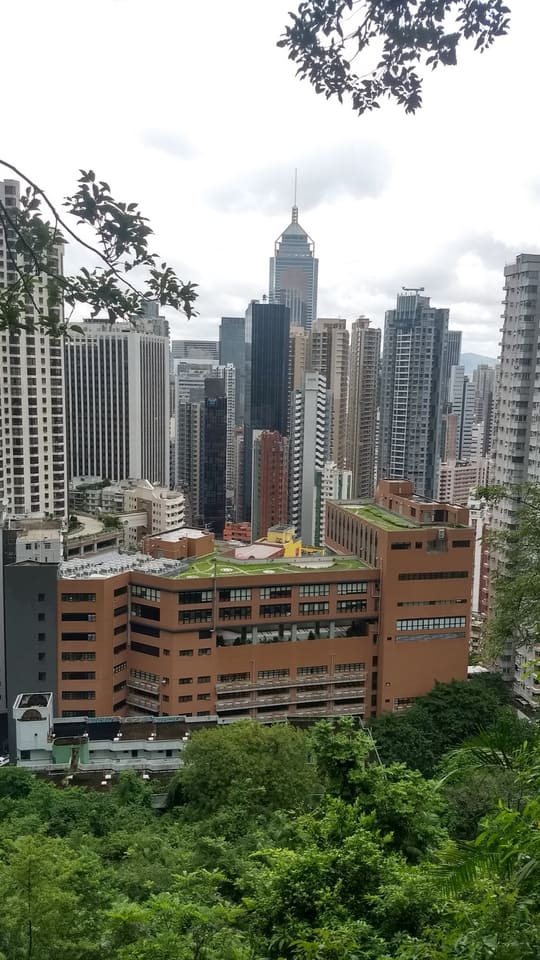 Shaded elevated walking path along Bowen Road in Hong Kong