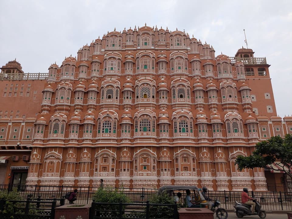 The honeycombed pink façade of Hawa Mahal in Jaipur