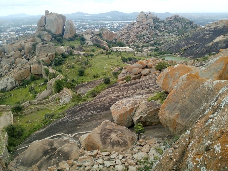 Wide view across boulders and fort walls at Chitradurga