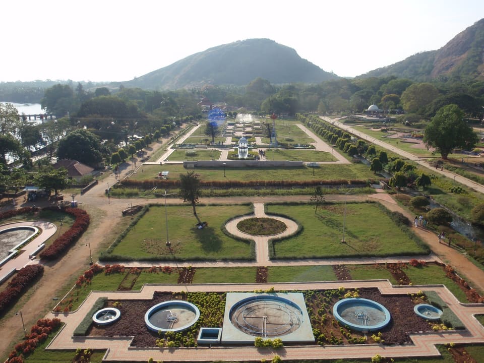 Formal gardens and fountains below the hills at Malampuzha