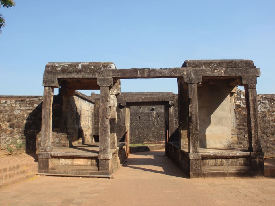 Green moat and stone walls around Palakkad Fort