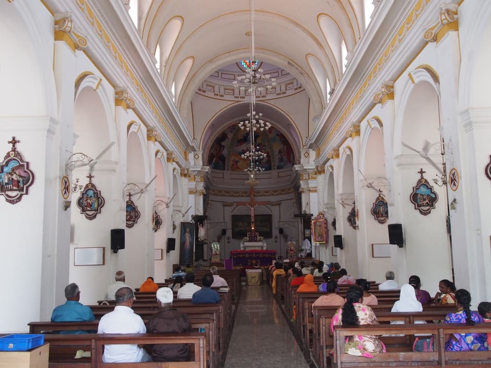 Quiet tree-lined lane among Puducherry heritage buildings