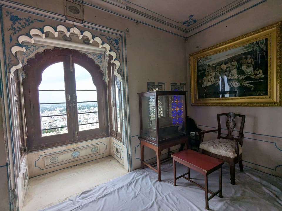Udaipur and Lake Pichola framed by a palace window