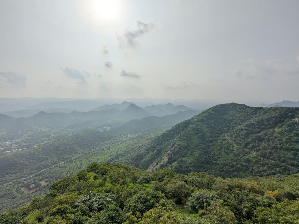 Green Aravalli hills viewed from the road to Monsoon Palace