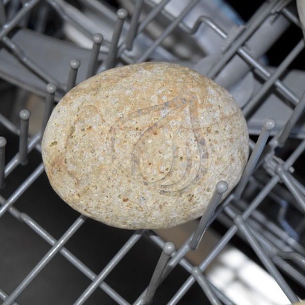 Rock placed within dishwasher rack for easy cleaning