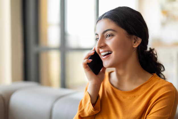 Indian individual accessing free counselling call through mobile app for mental health support and therapy consultation