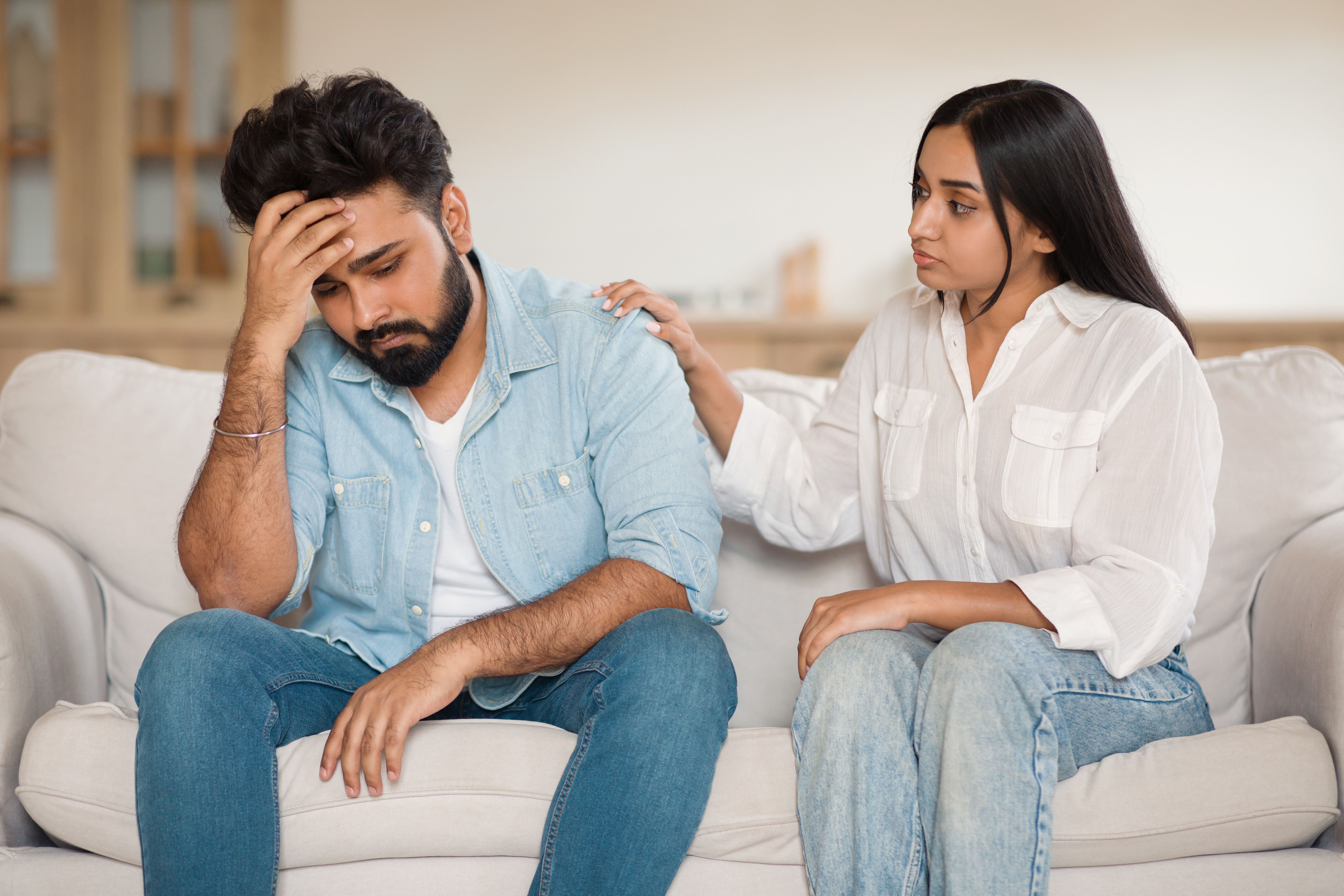 Therapist checking in with a client during a session — visual representing questions like 'Should I go to therapy?', 'Do I need therapy?', and 'When to seek therapy', highlighting key signs and benefits of talking to a mental health professional.