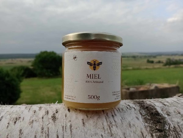 Miel crémeux d’été toutes fleurs ensemencé avec du miel de printemps