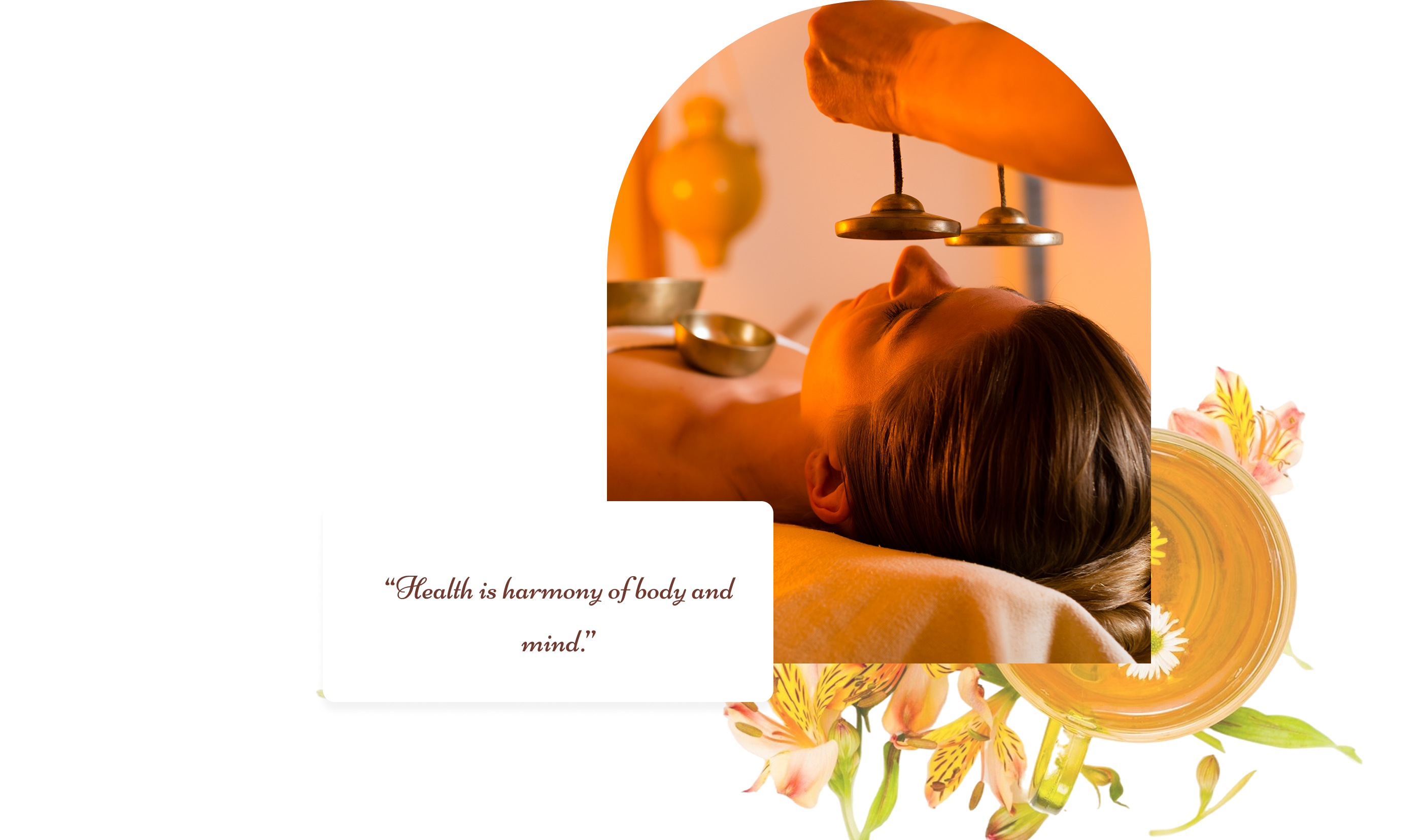 A woman receiving a Shirodhara Ayurvedic treatment.