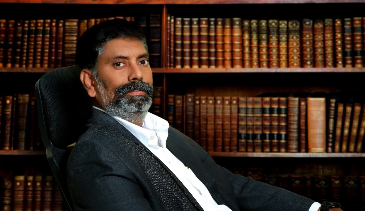 A classic law office background with books and a gavel.