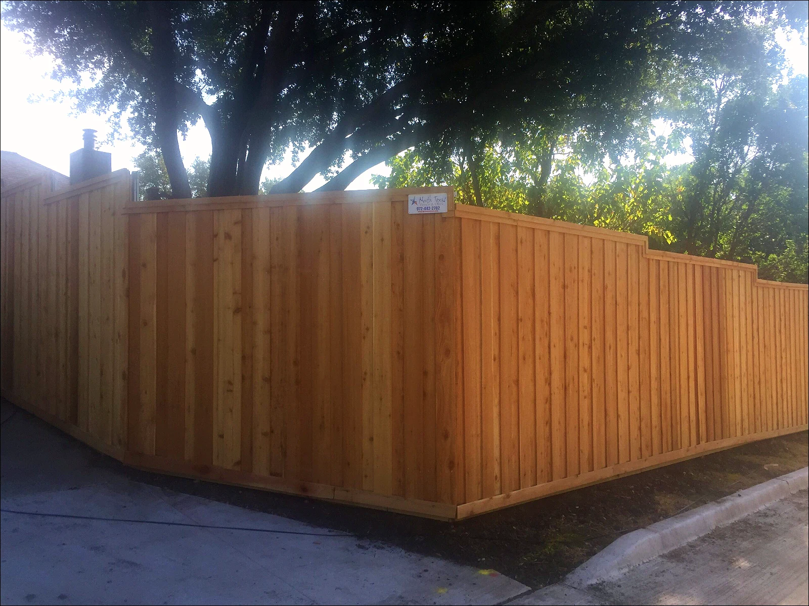 Board-on-board wood fence craftsmanship in North Texas