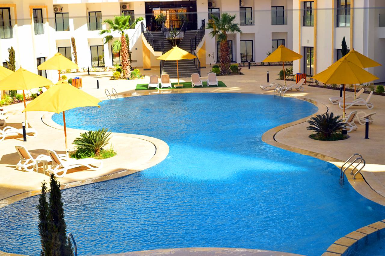 Comfortable apartment with a pool view at Aqua Infinity Resort, Hurghada.