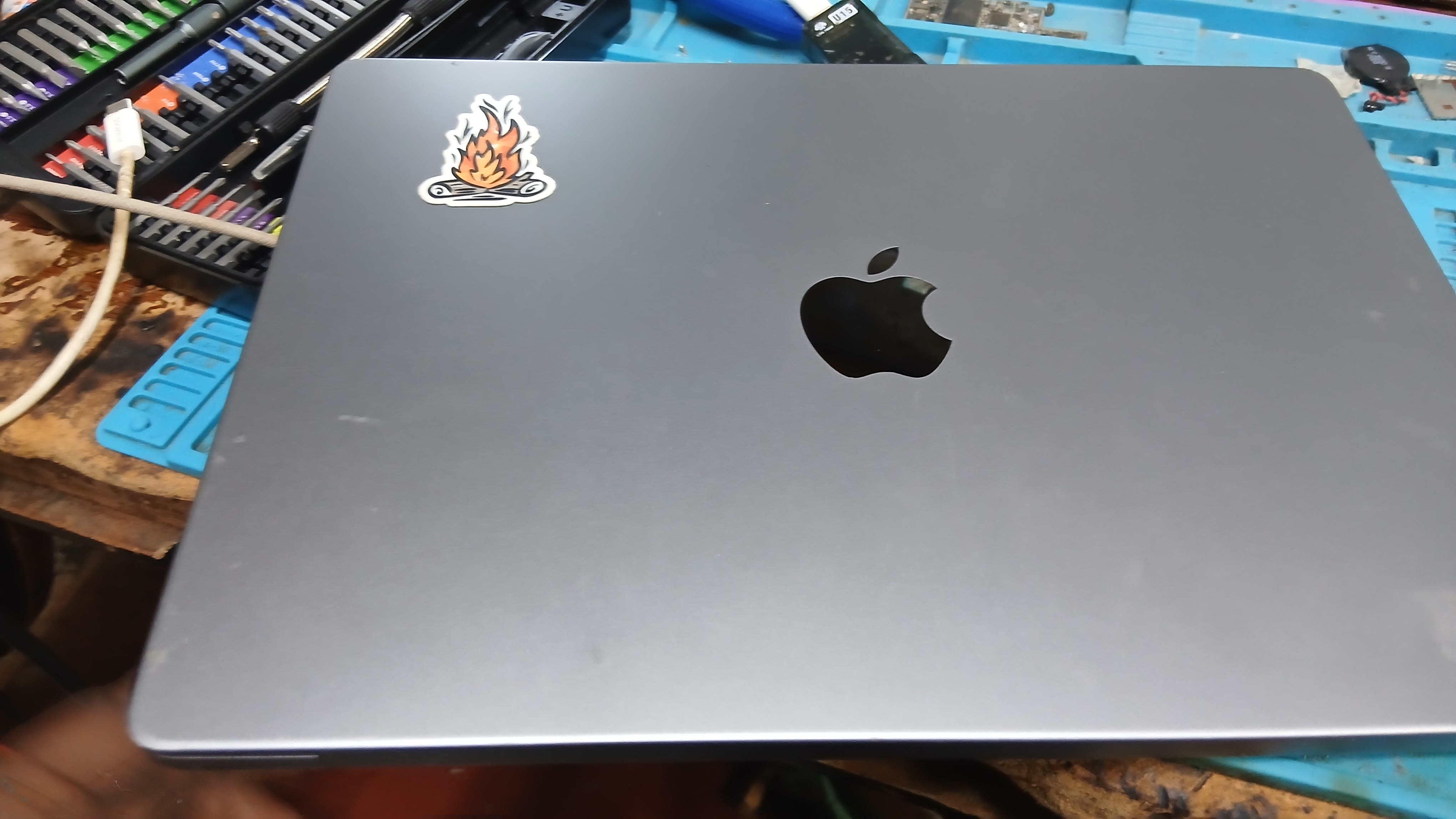 Pristine MacBook Pro M3 space grey aluminum chassis on Watz Electronix intake bench