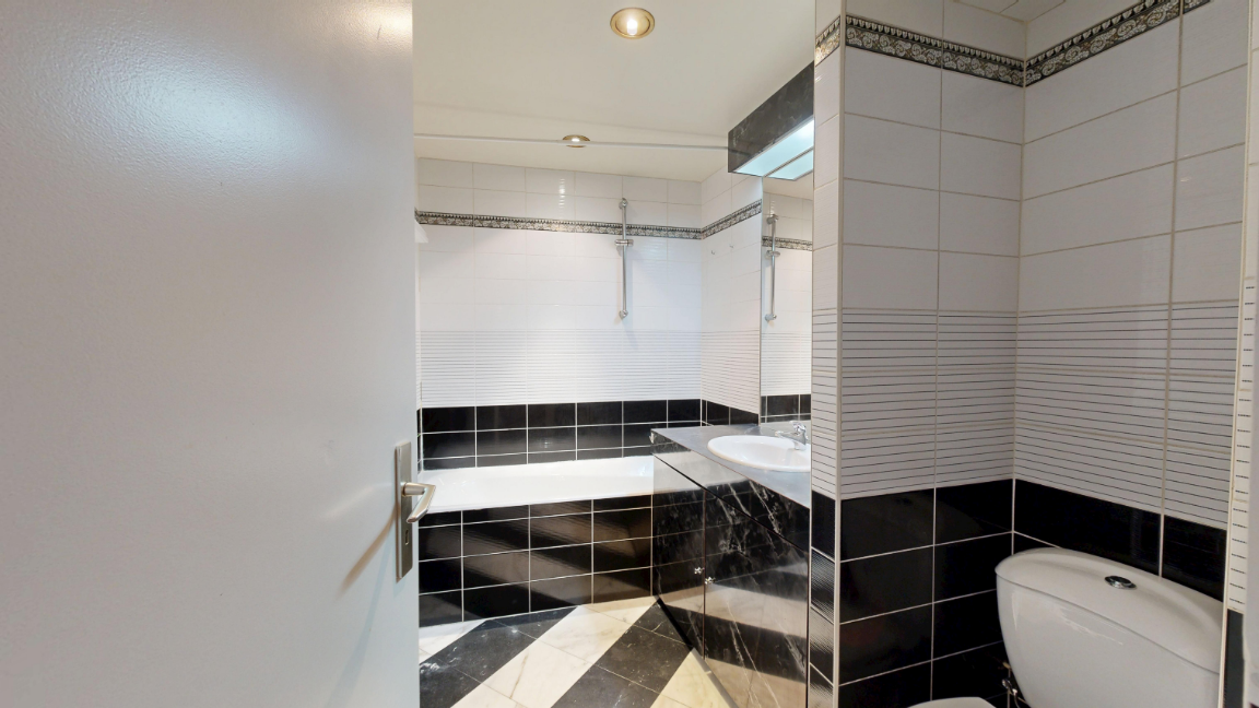 Old bathroom with dated tiles