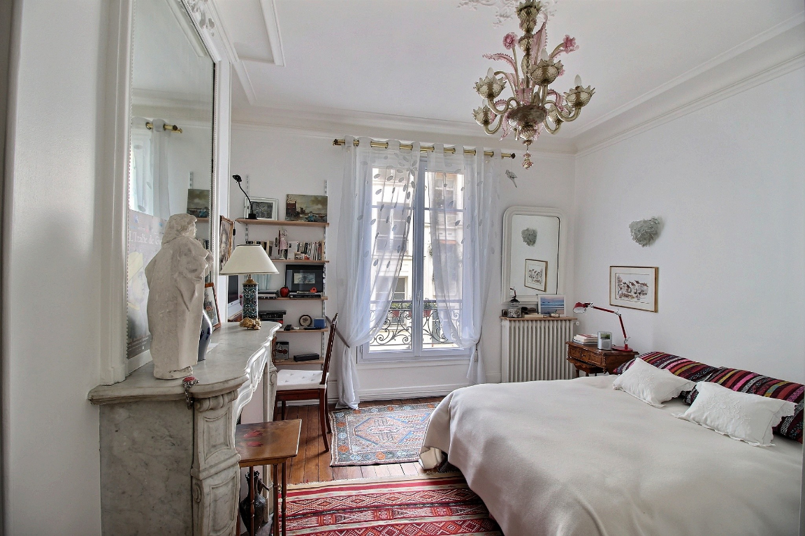 Rénovation chambre parisienne vers style Ethnic