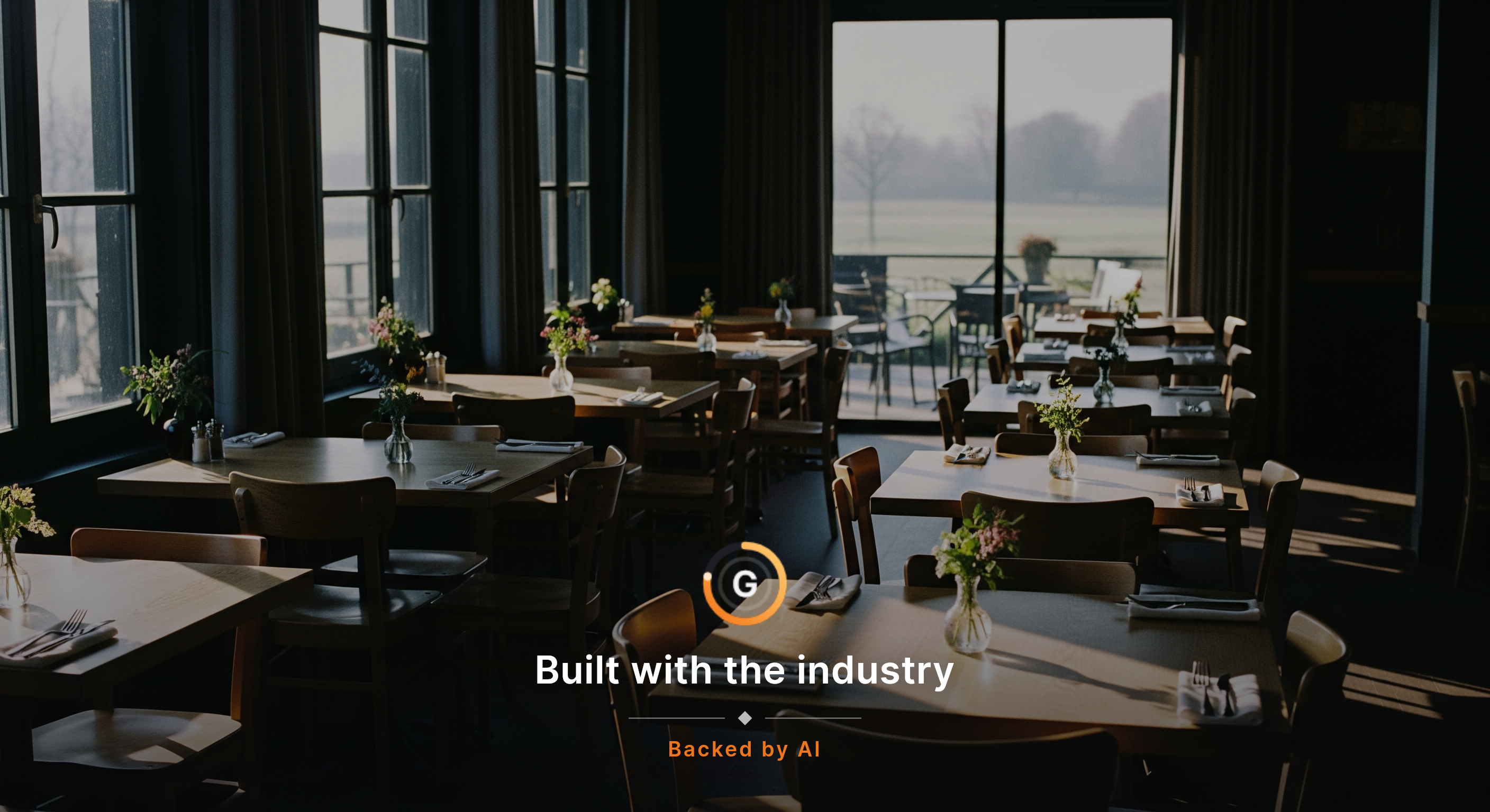 An empty boutique hotel dining room just before open, early natural light across wooden tables, chairs still neatly tucked, a few seasonal stems in simple vases, and a view toward a quiet terrace or field beyond. The room should feel intentional and calm, with no people, no visible text, no screens,