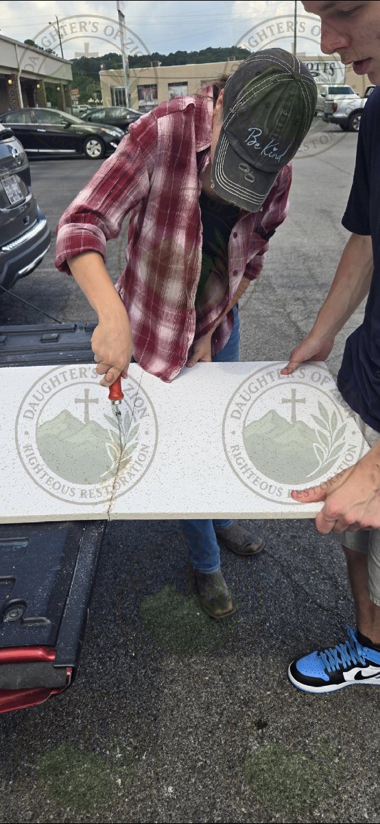 installing ceiling tiles — Eileen Moore