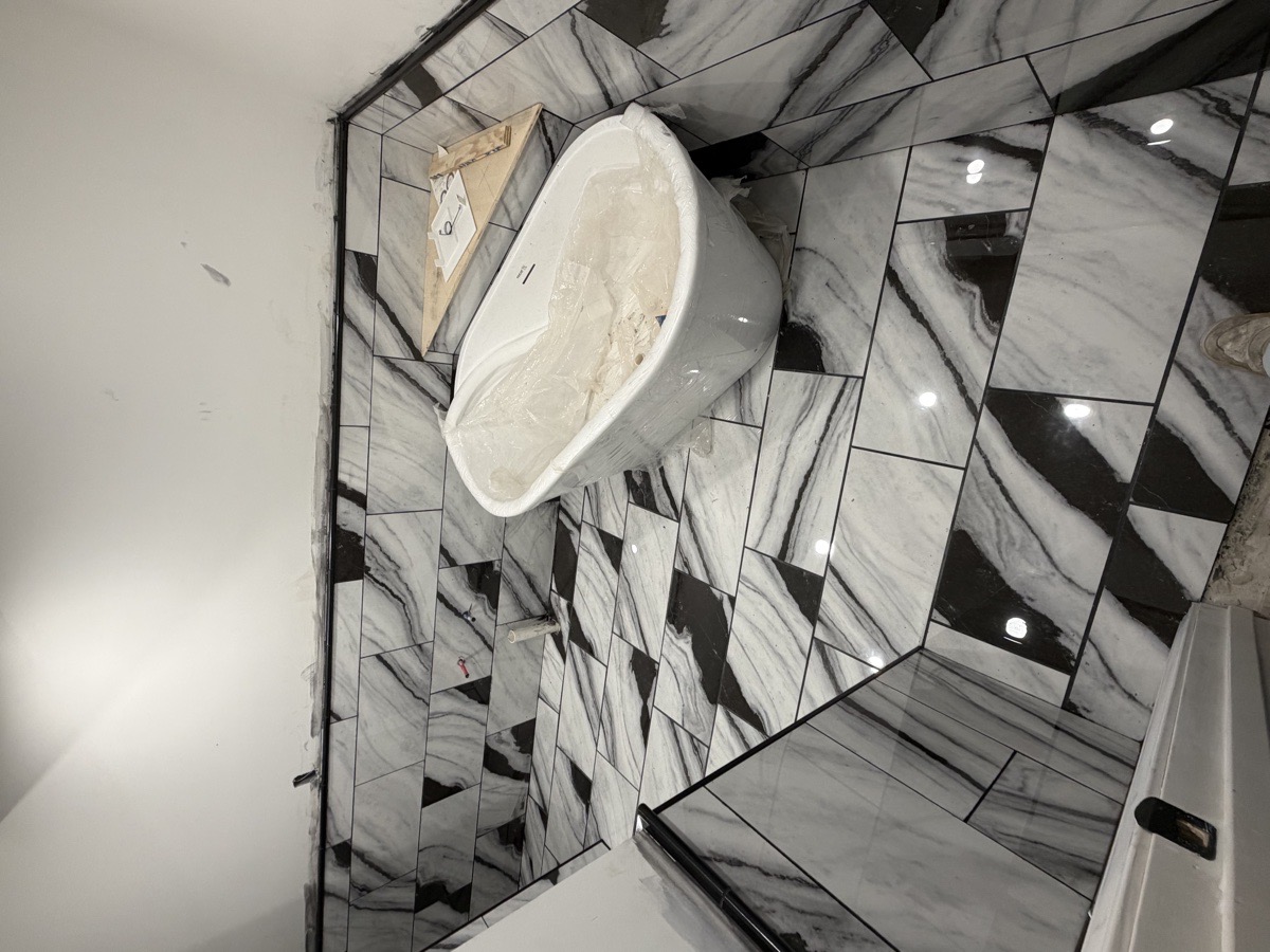 bathroom floor wall and shower install — Dominic Boscarello