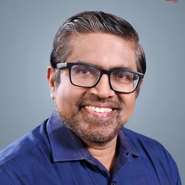 Headshot of Dr Varghese Punnoose