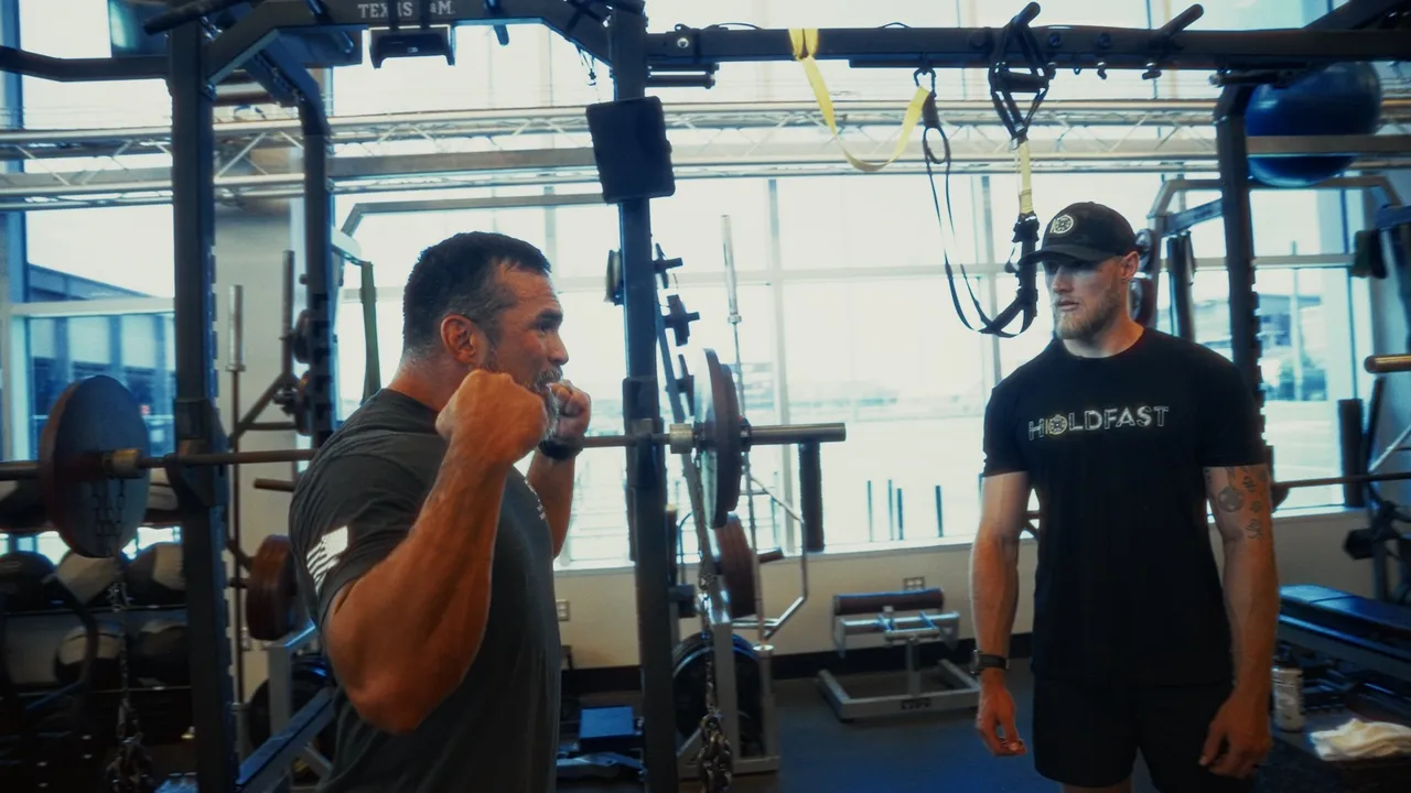 WorkBuilt coaches reviewing movement and training intent in the gym