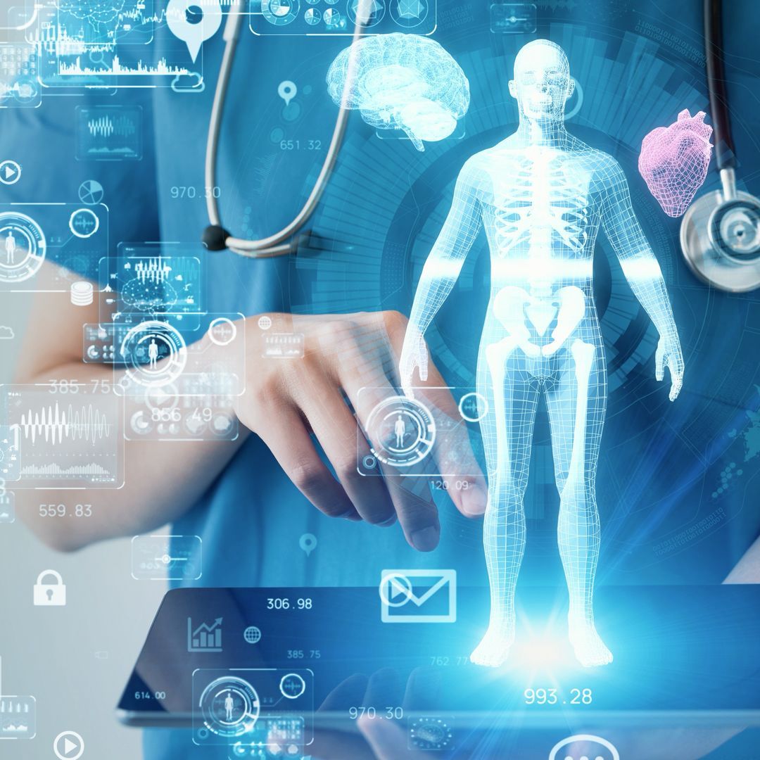 Physician holding a tablet with a human body graphic and medical technology icons.  
