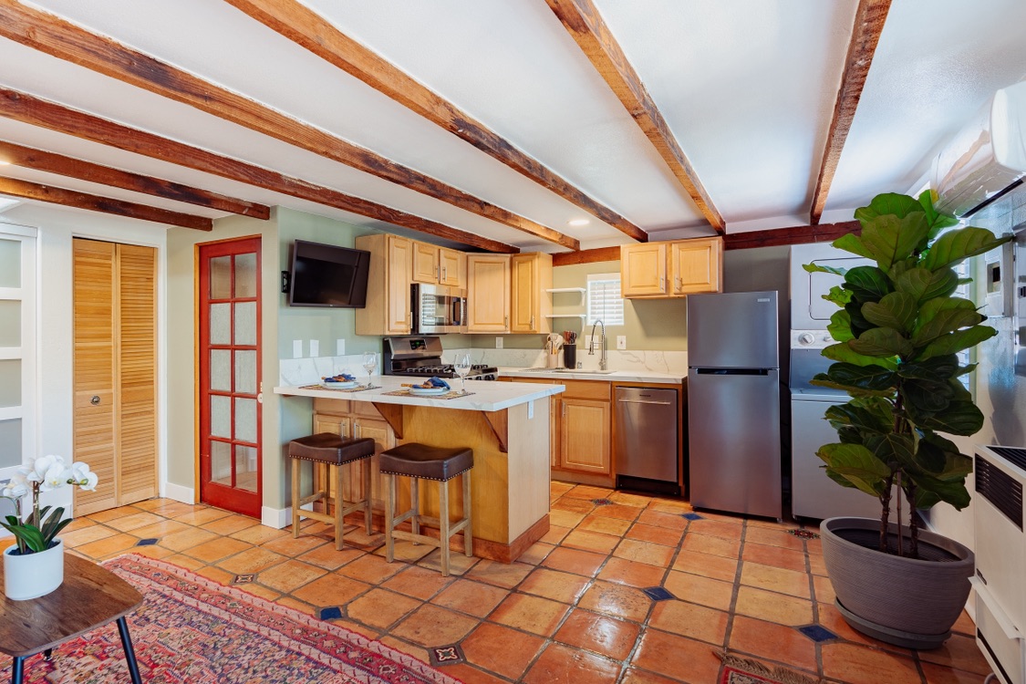 Spanish Studio with 100sft private patio, W/D in unit, Parking & Utilities Included