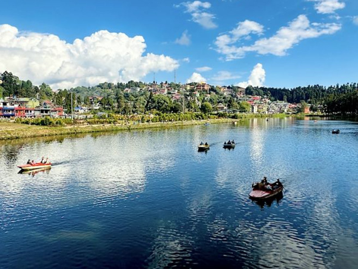 Boating on the serene Sumendu Lake in Mirik, Darjeeling