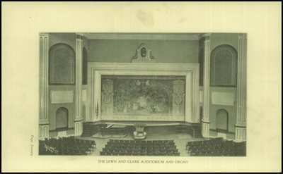 Yearbook photograph of the auditorium stage, piano, organ console and seating