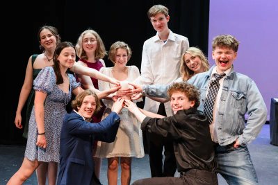 Tiger Drama Thespian officers celebrating together onstage
