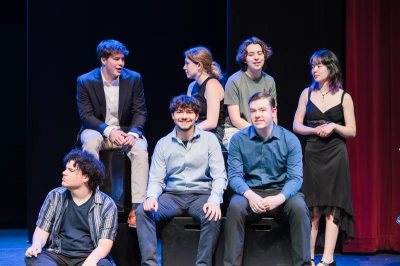 Tiger Drama students gathered onstage at a Thespian induction celebration
