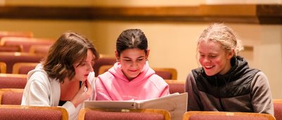 students reading a script
