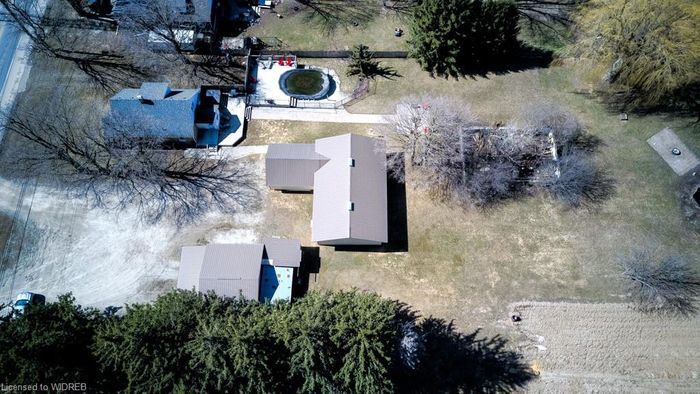 6.1 ACRE- M2 INDUSTRIAL LOT WITH 2 BED 1 BATH STOREY HOME