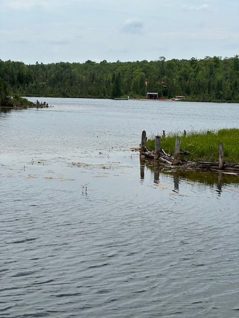 50+ acres of farm land backs on a lake, ideal for camping ground