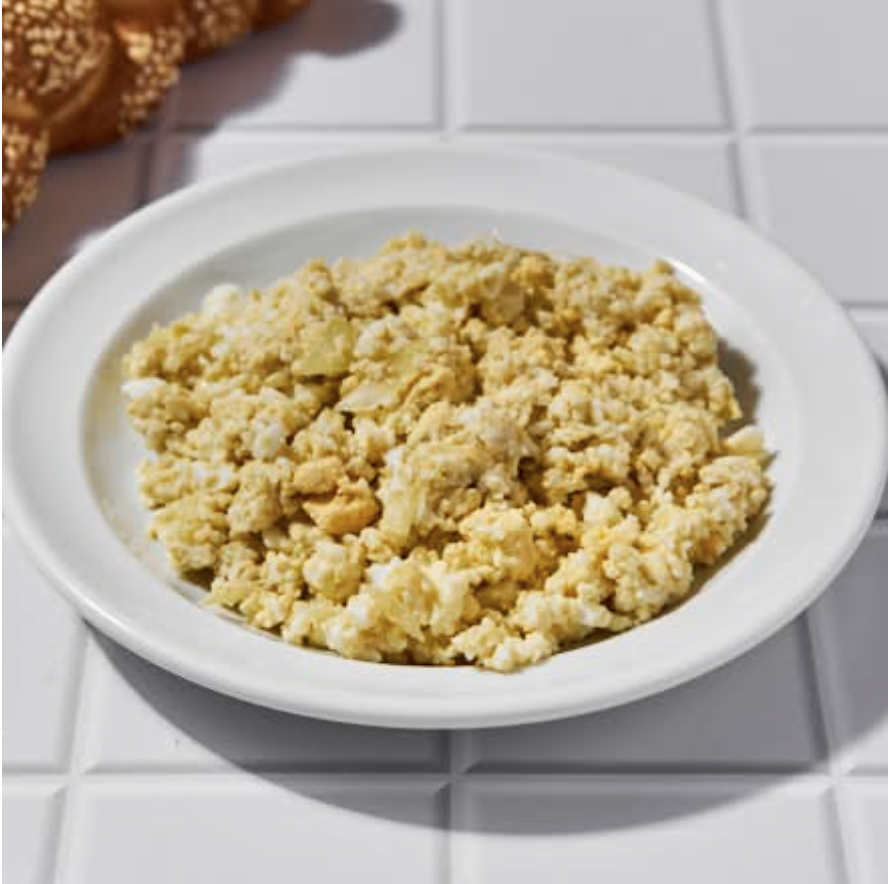 Salade d'œufs et oignons hachés