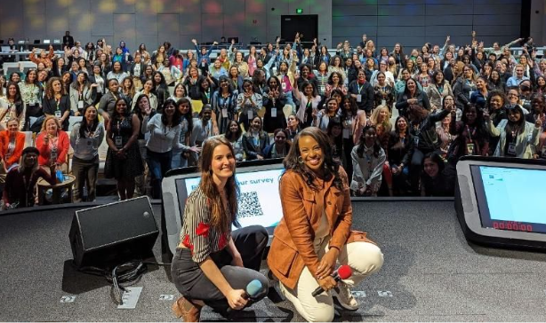 Group photo of the Women Techmakers community in an auditorium at Google I/O conference.