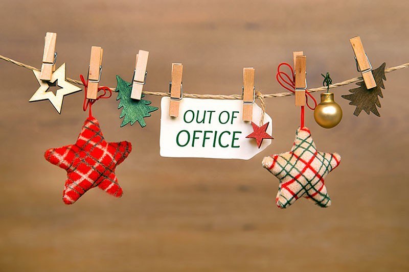 A Christmas-themed image with the text Out of Office
