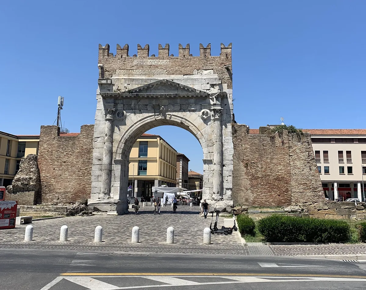 Arch of Augustus, Rimini: where your mission begins.