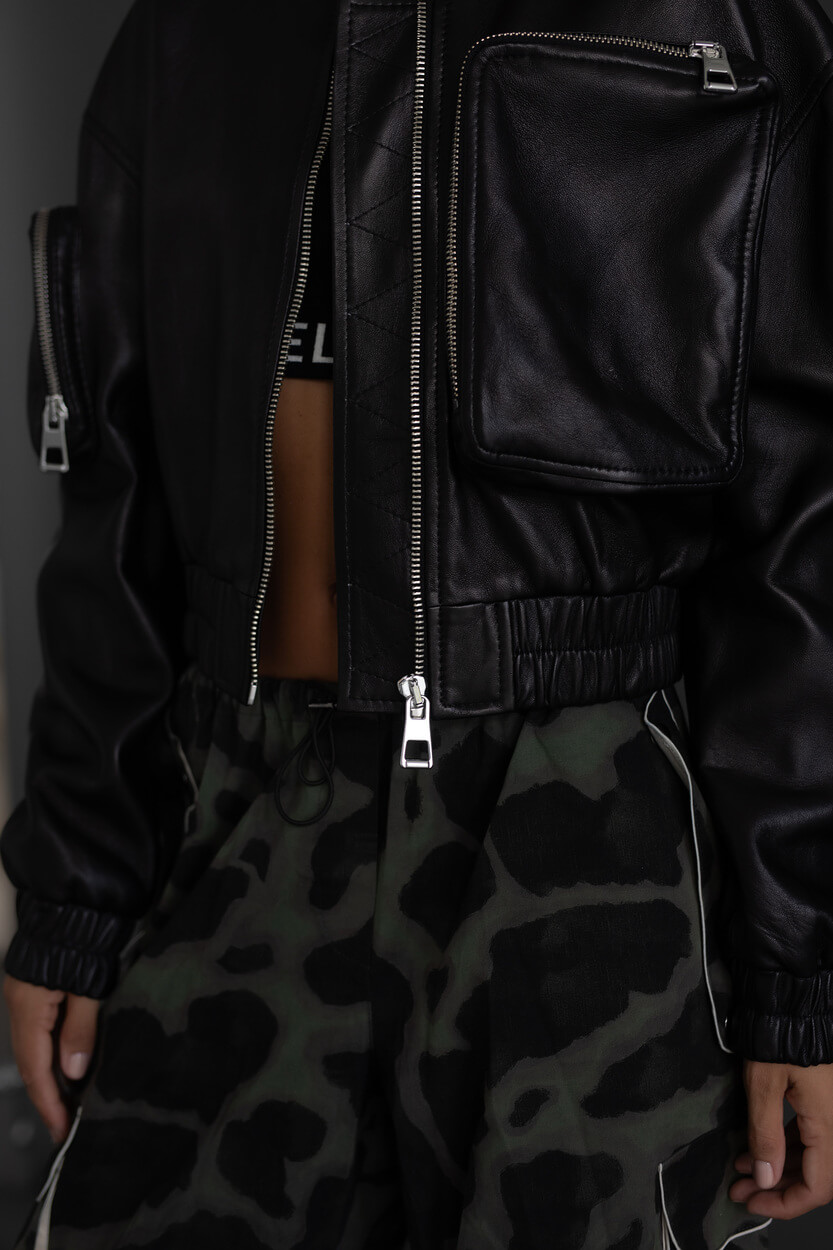 Bomber with pockets on the arms and chest