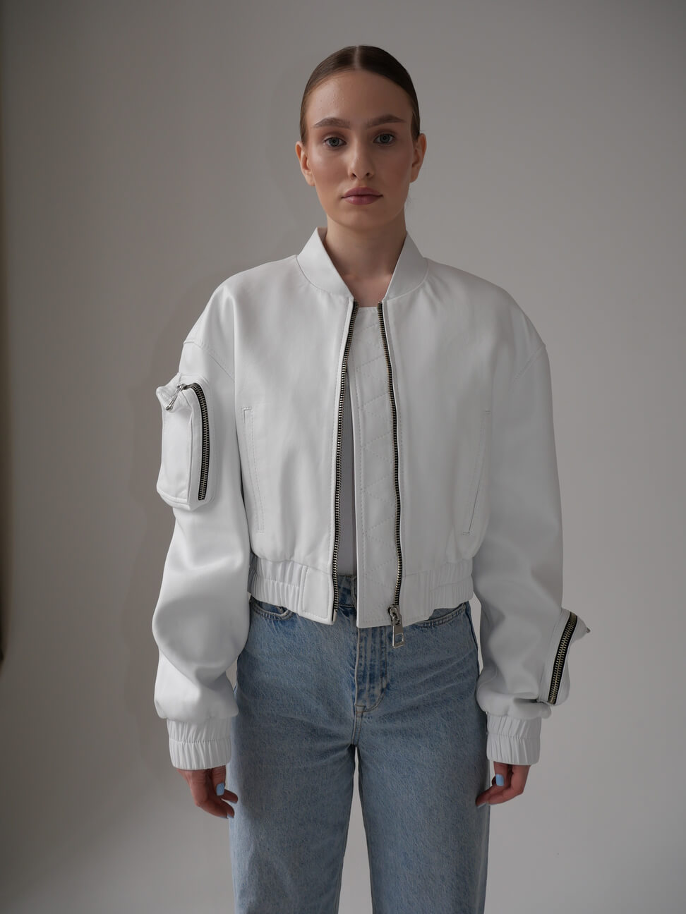 Bomber with pockets on the arms