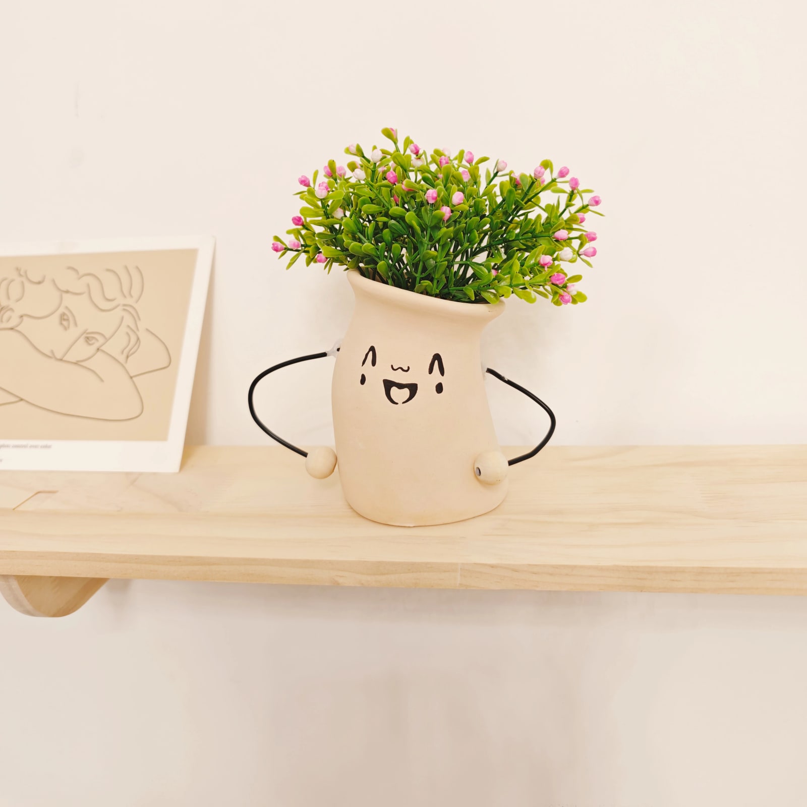 Ceramic Face Planter with Artificial Flower Arrangement photo 5