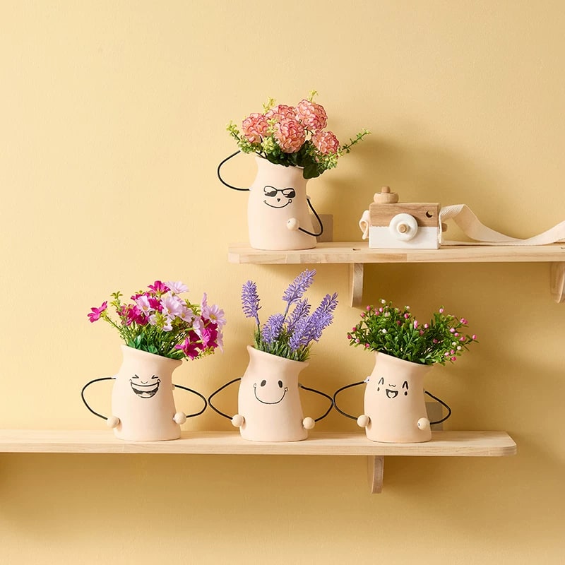 Ceramic Face Planter with Artificial Flower Arrangement photo 2