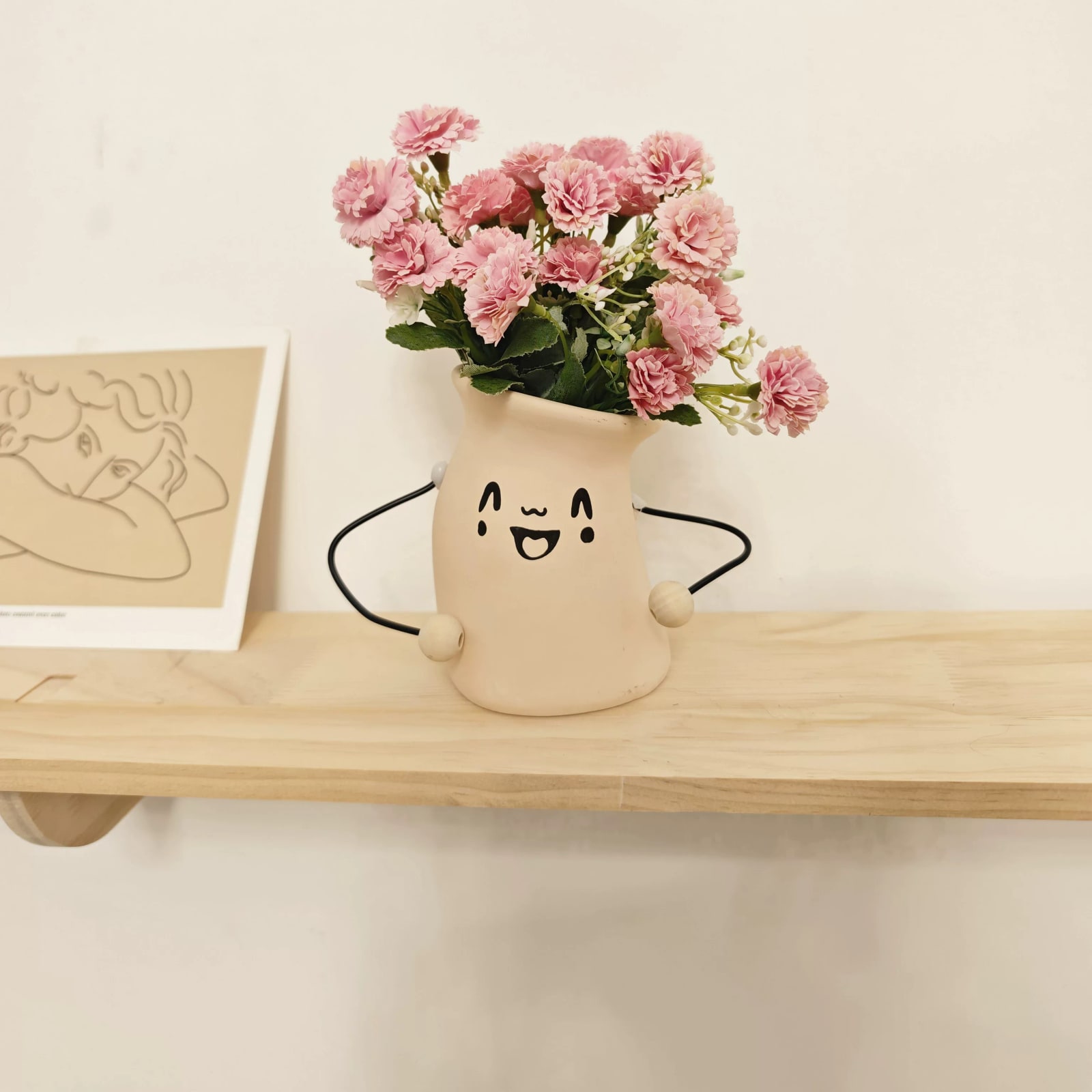 Ceramic Face Planter with Artificial Flower Arrangement photo 3