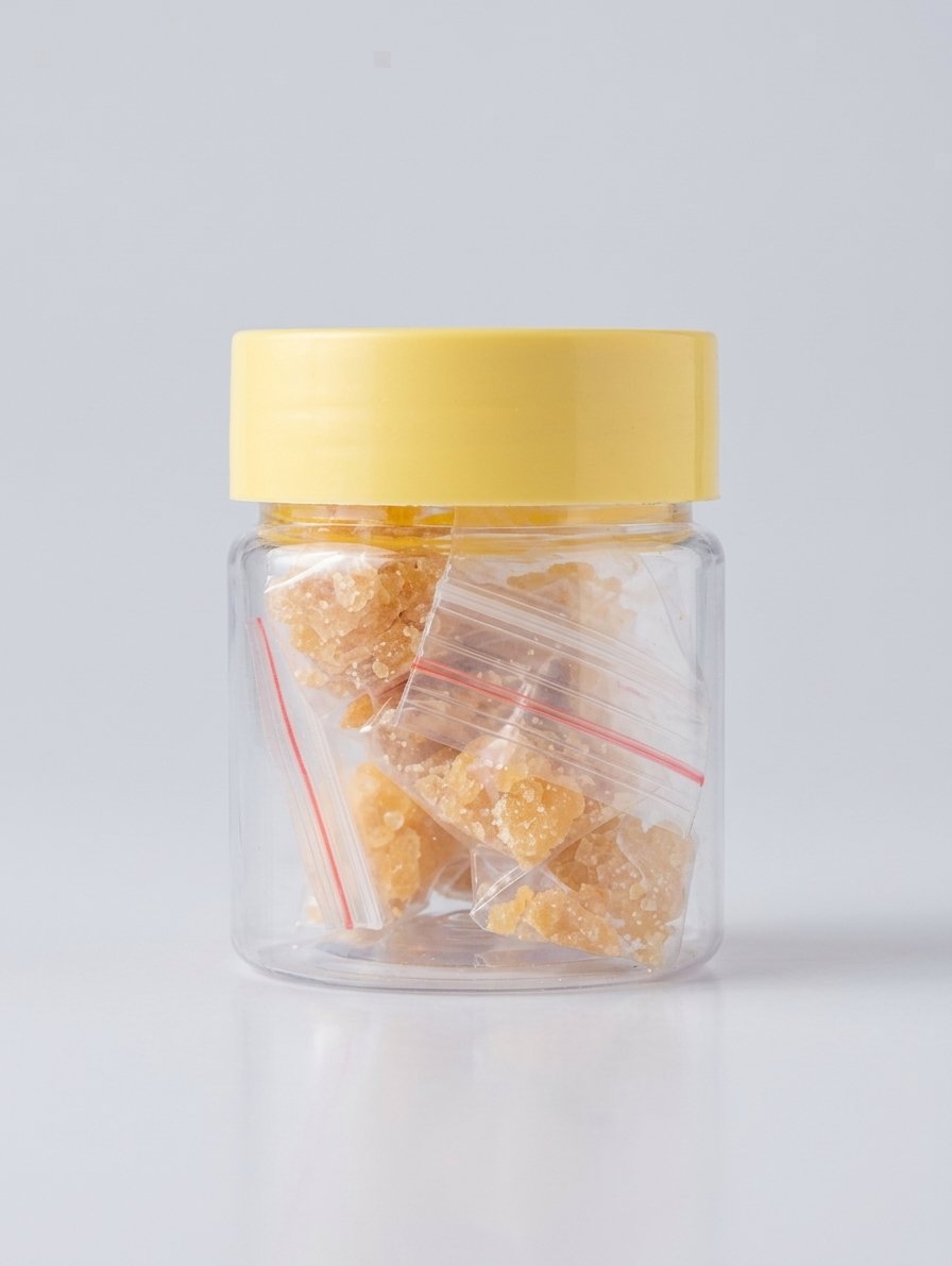 Solid Hing Chunks in Plastic Jar