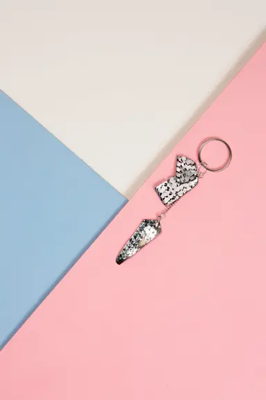 Keyring: Three Charm black and silver foiled design on chain