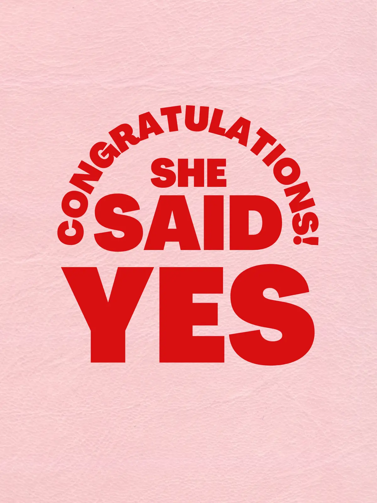 Engagement card with the text "Congratulations! She Said Yes" in bold red letters on a soft pink background, modern and minimalist design.