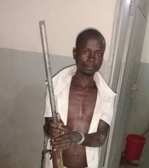 Man arrested for allegedly possessing a firearm