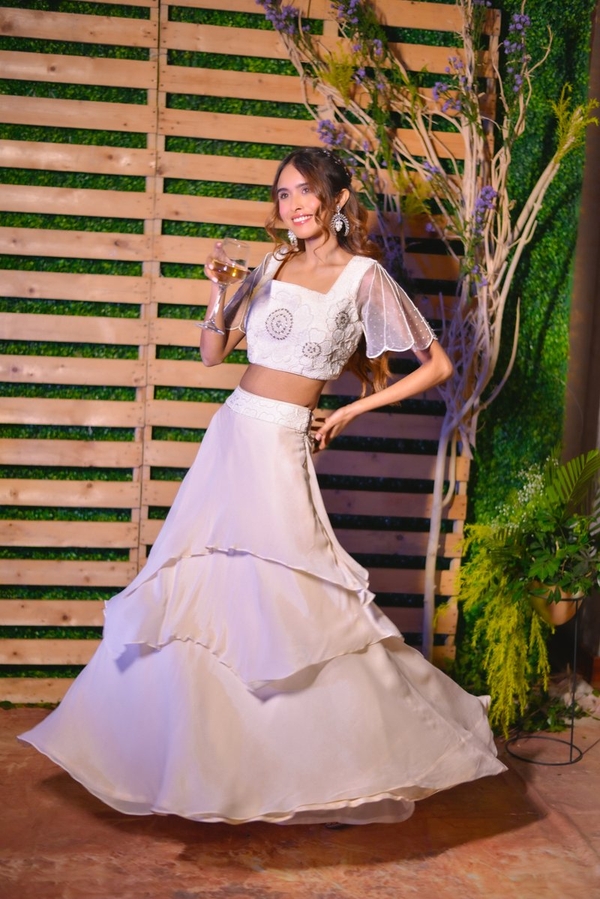 Ivory Layered Skirt with Sheer Sleeve Crop Top in White by Gaurav Dipika