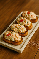 Brusqueta camarão ao cream cheese